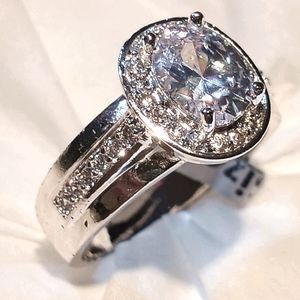 Silver ring, white sapphire center